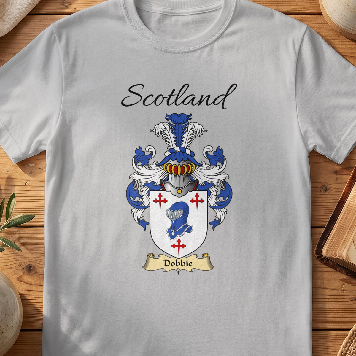 Sport Grey Dobbie Scottish family shield T-shirt featuring a blue animal head surrounded by red crosses