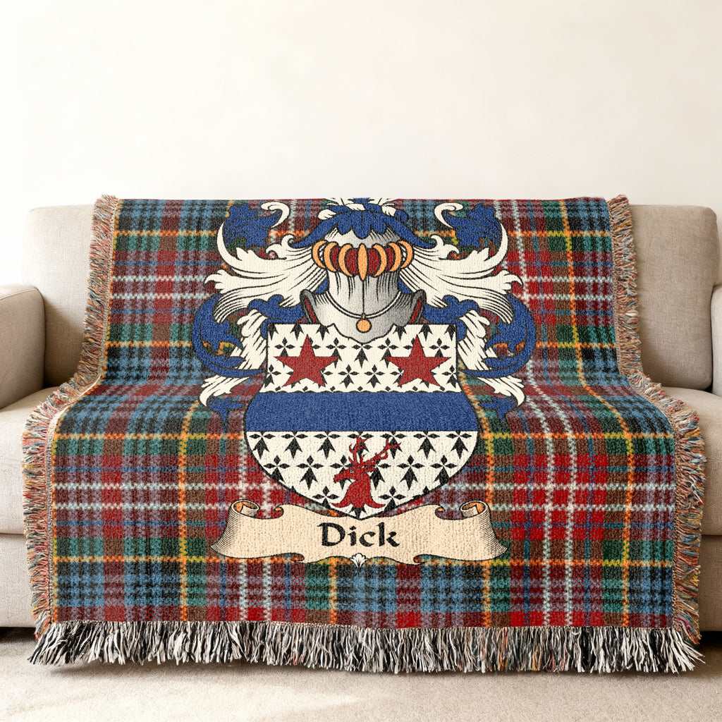 Dick family crest emblem on a Caledonia tartan woven blanket