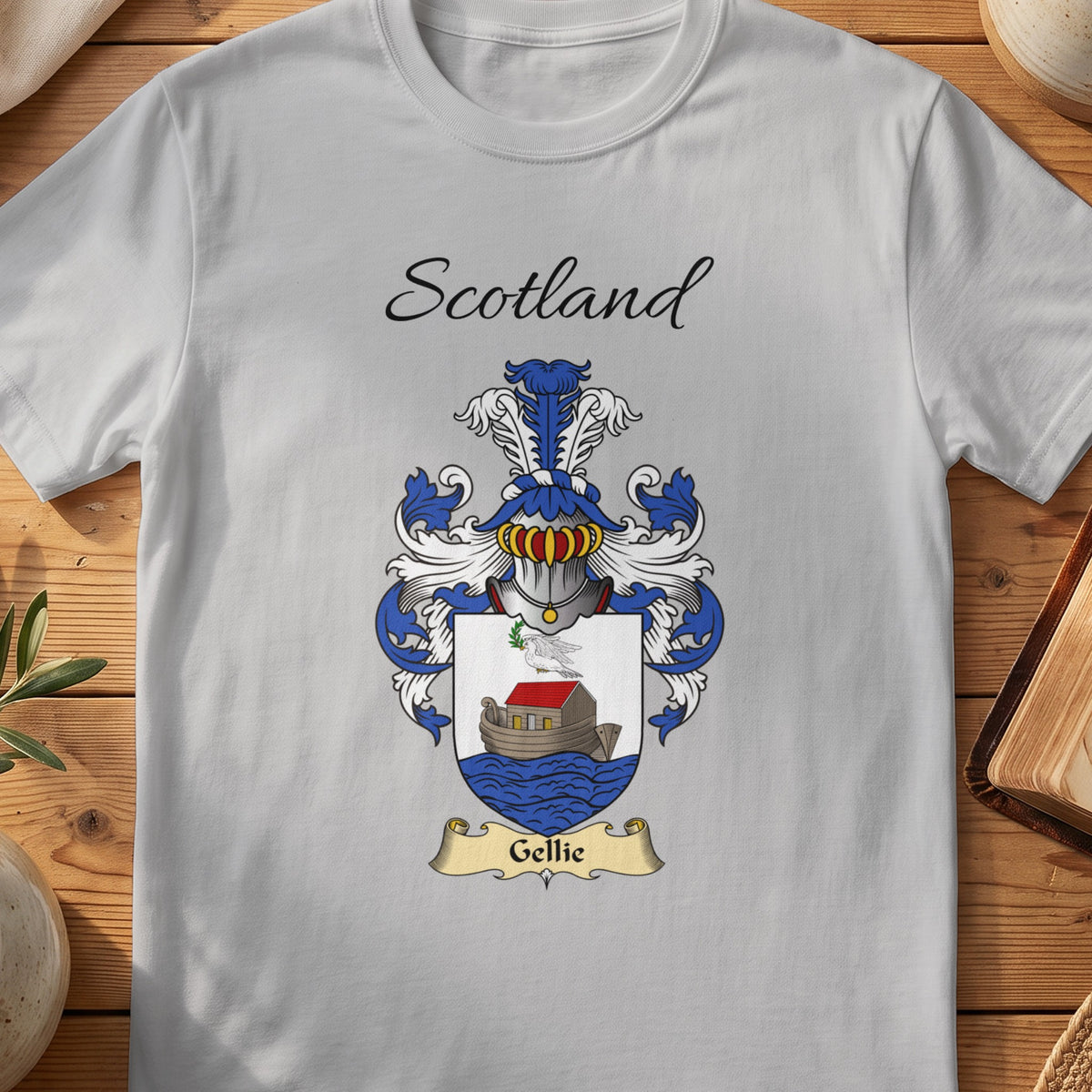 Sport Grey Gellie Scottish family shield T-shirt featuring a boat on blue waves beneath a pale sky