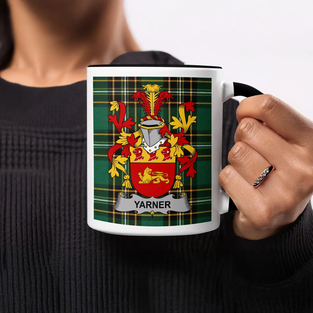 Mug with Yarner family crest on green tartan background.