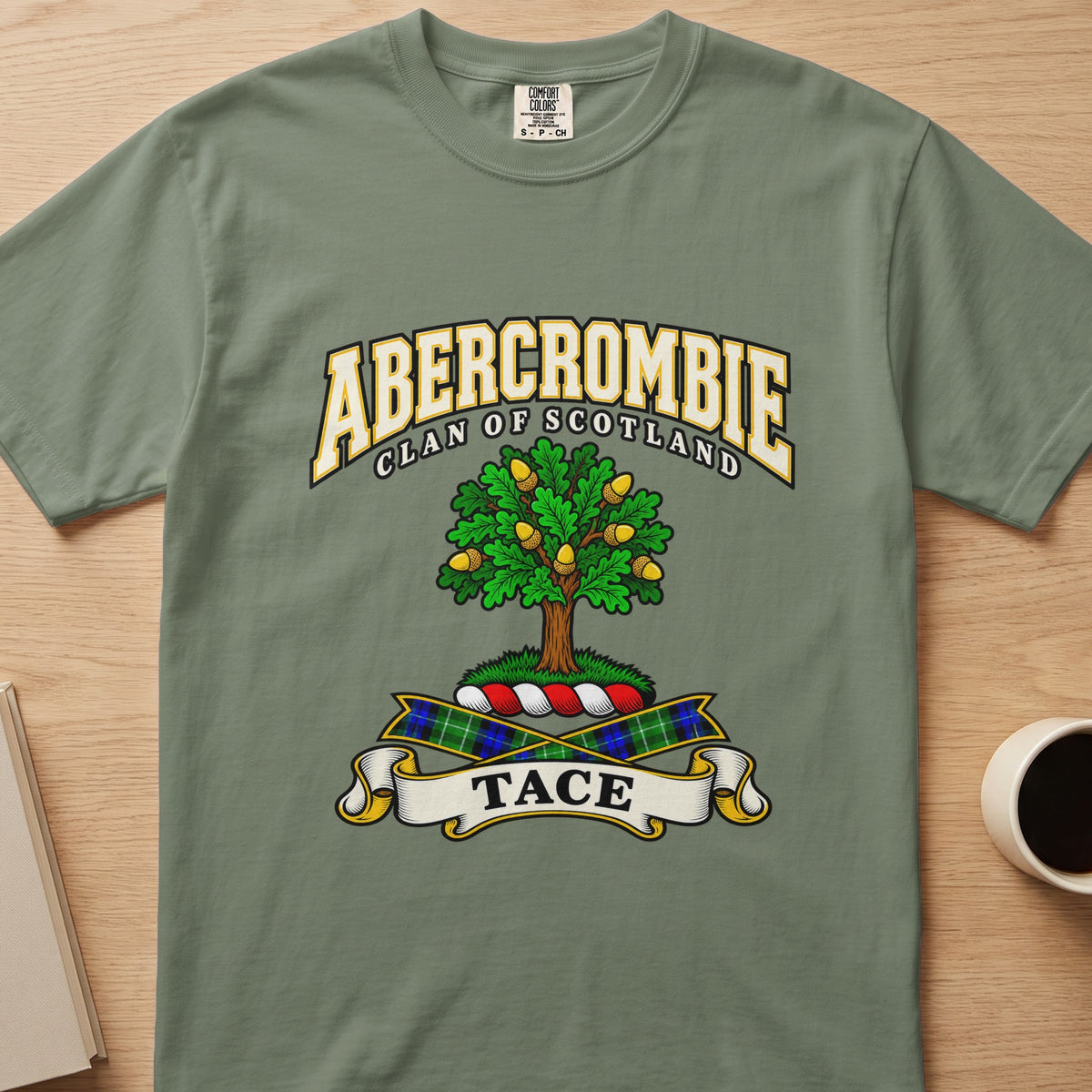 Abercrombie green tree with golden fruit detail graphic on a sage green Comfort Colors T-shirt, front view