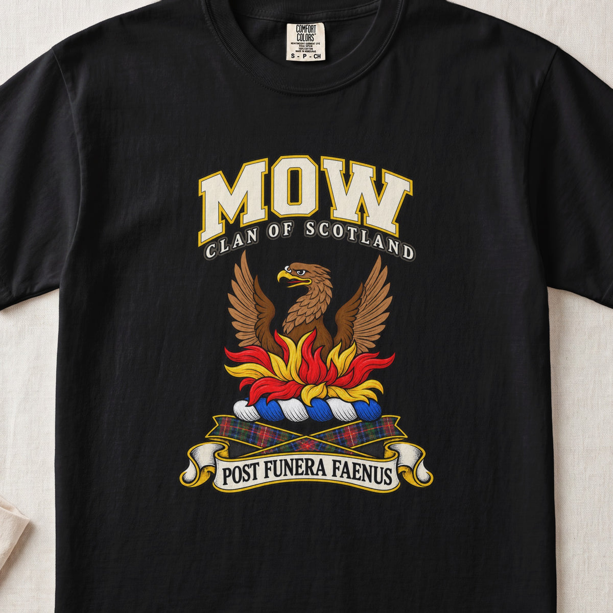 Mow Scottish clan T-shirt in Black, front view with a brown bird with spread wings rising above red and gold flames and motto design.