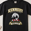 Kennedy Scottish clan T-shirt in Black, front view with a curved silver fish motif and motto banner.