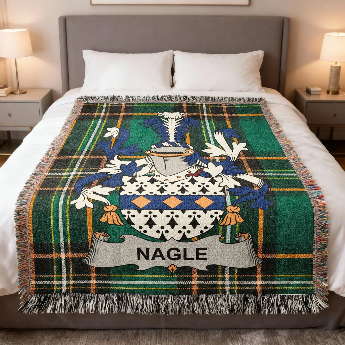 Nagle family crest on a green plaid woven throw blanket on a bed.