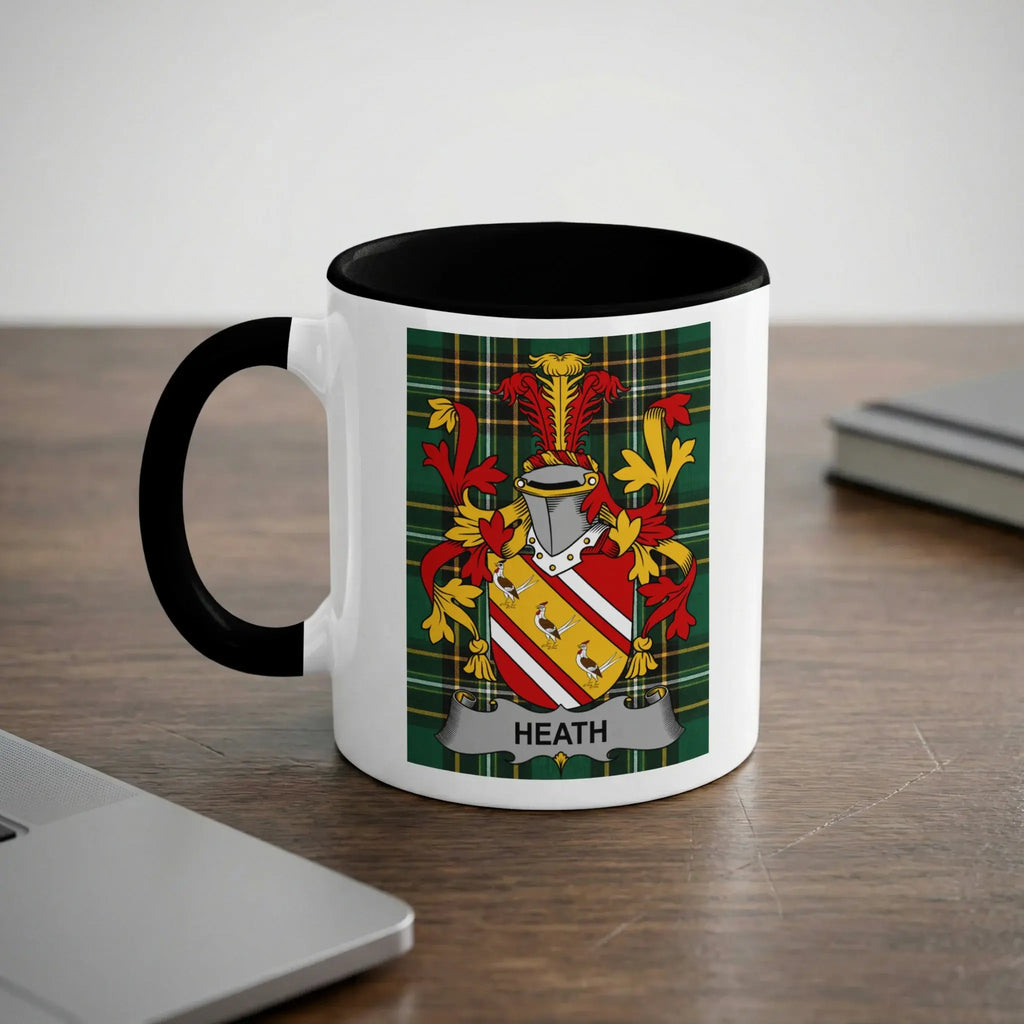 White mug with black handle featuring the Heath family crest.