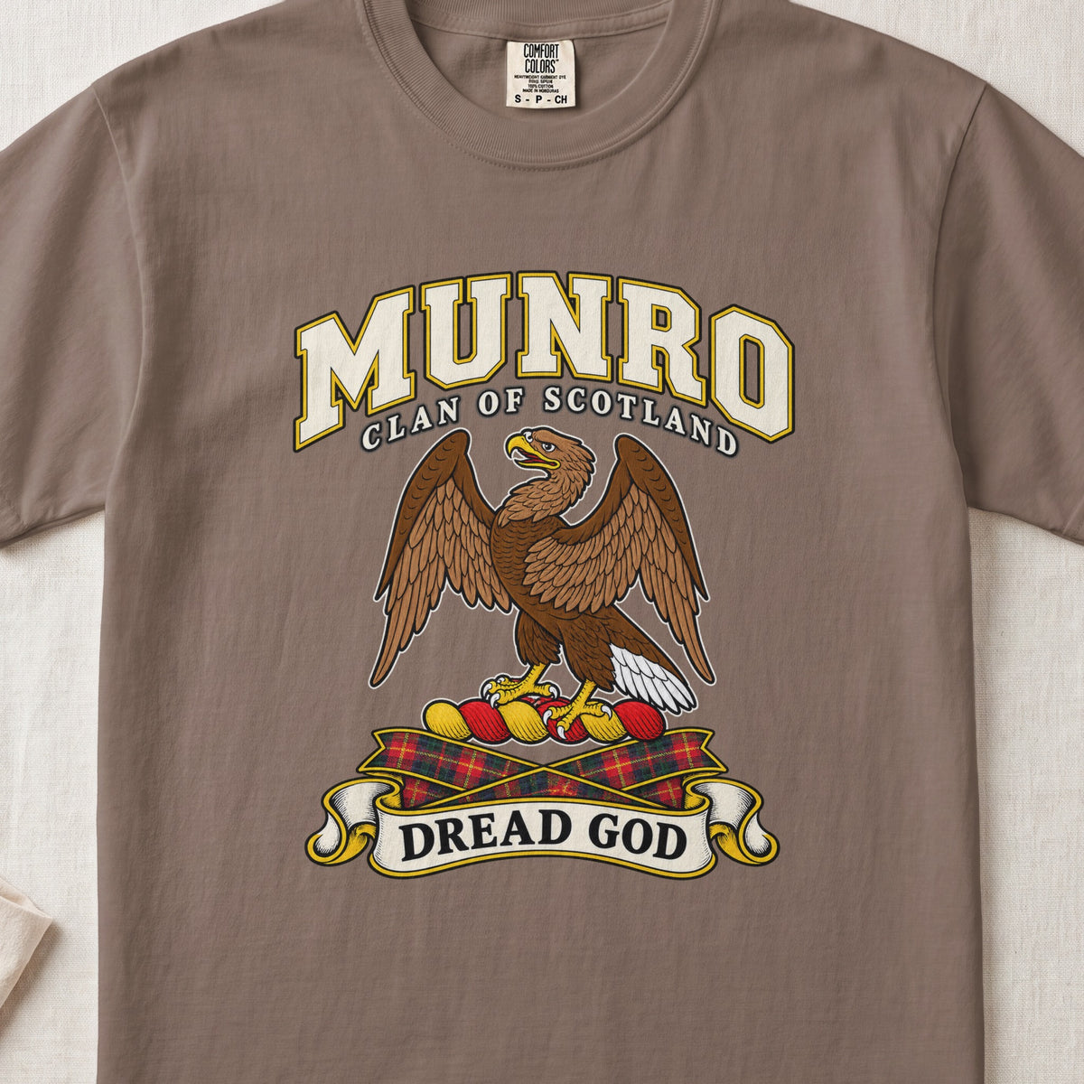 Munro Scottish clan T-shirt in Espresso, front view with a brown eagle with spread wings and motto banner.