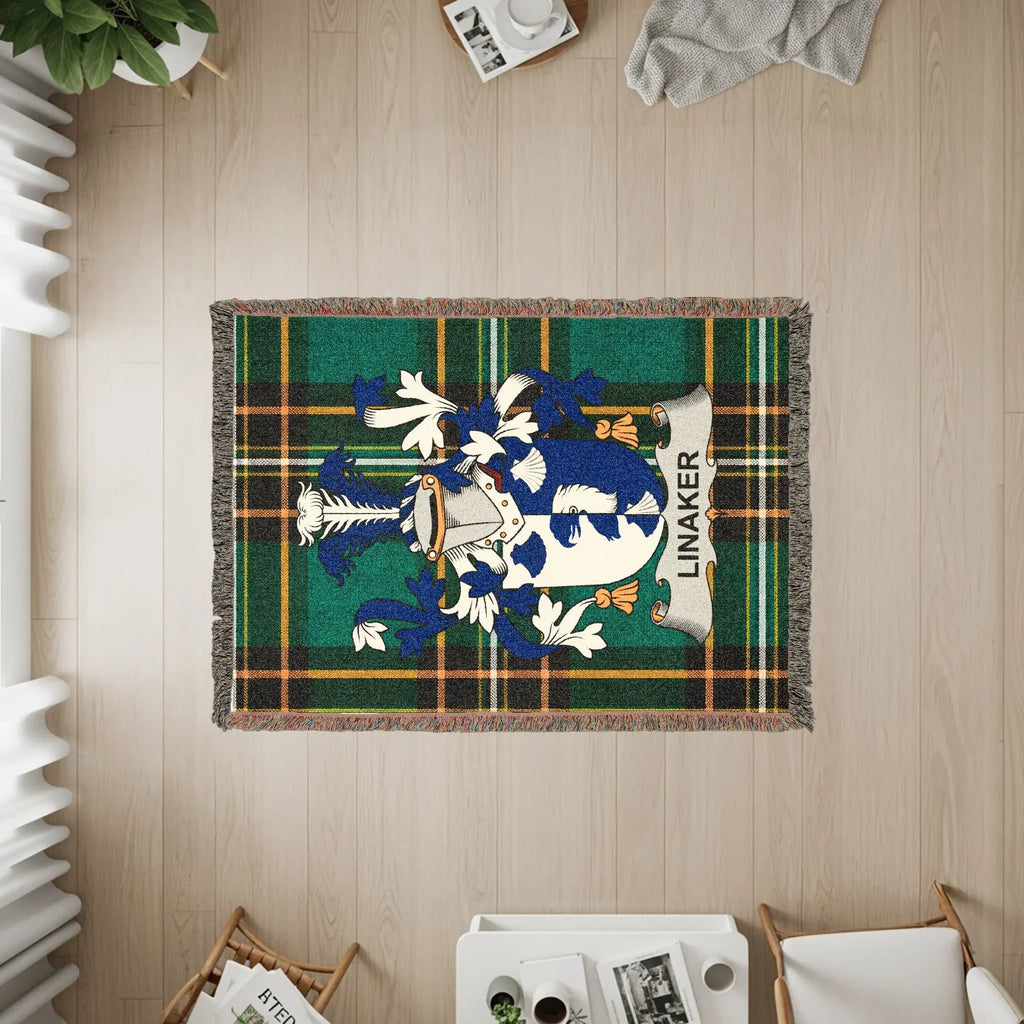 Linaker tartan woven blanket featuring a coat of arms.