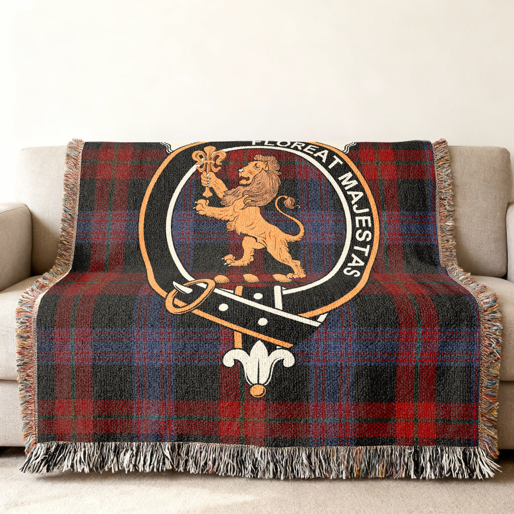 Brown clan crest with lion woven into tartan throw blanket