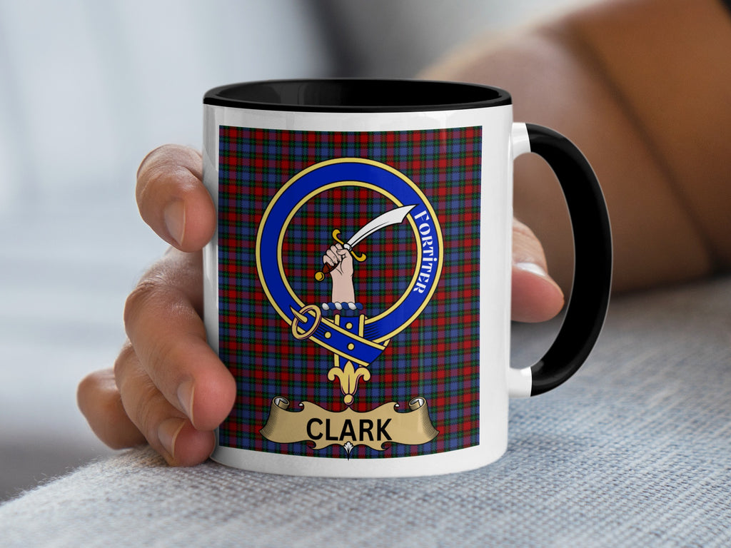 Clark crest with sword and Fortiter motto on tartan mug — close detail