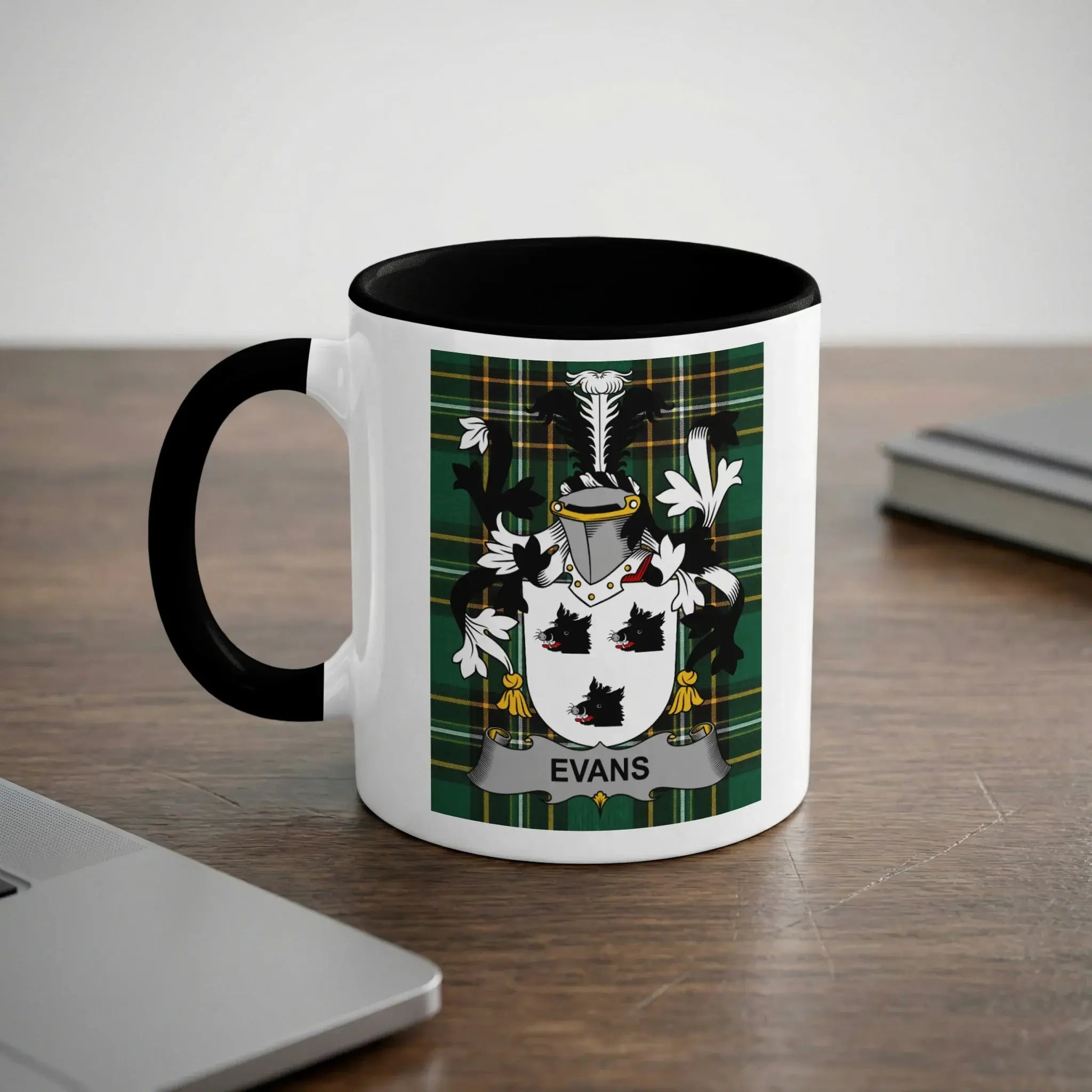 White mug with black rim featuring the Evans family crest.