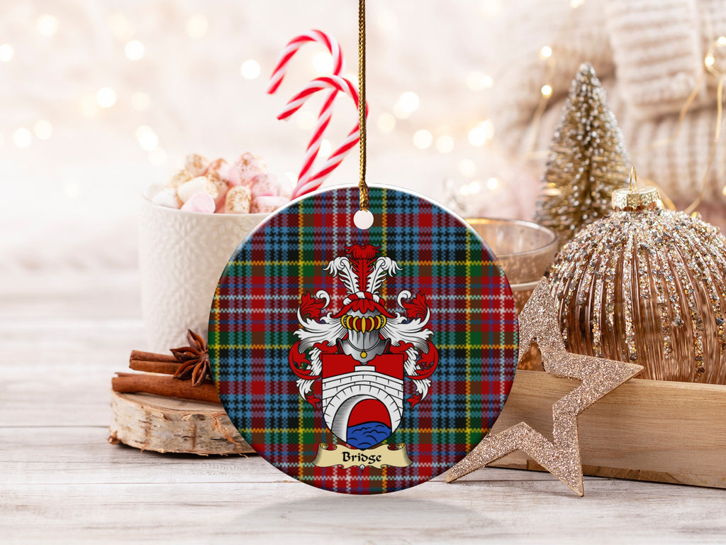 Bridge family emblem ceramic Christmas ornament with Caledonia tartan background in festive holiday décor