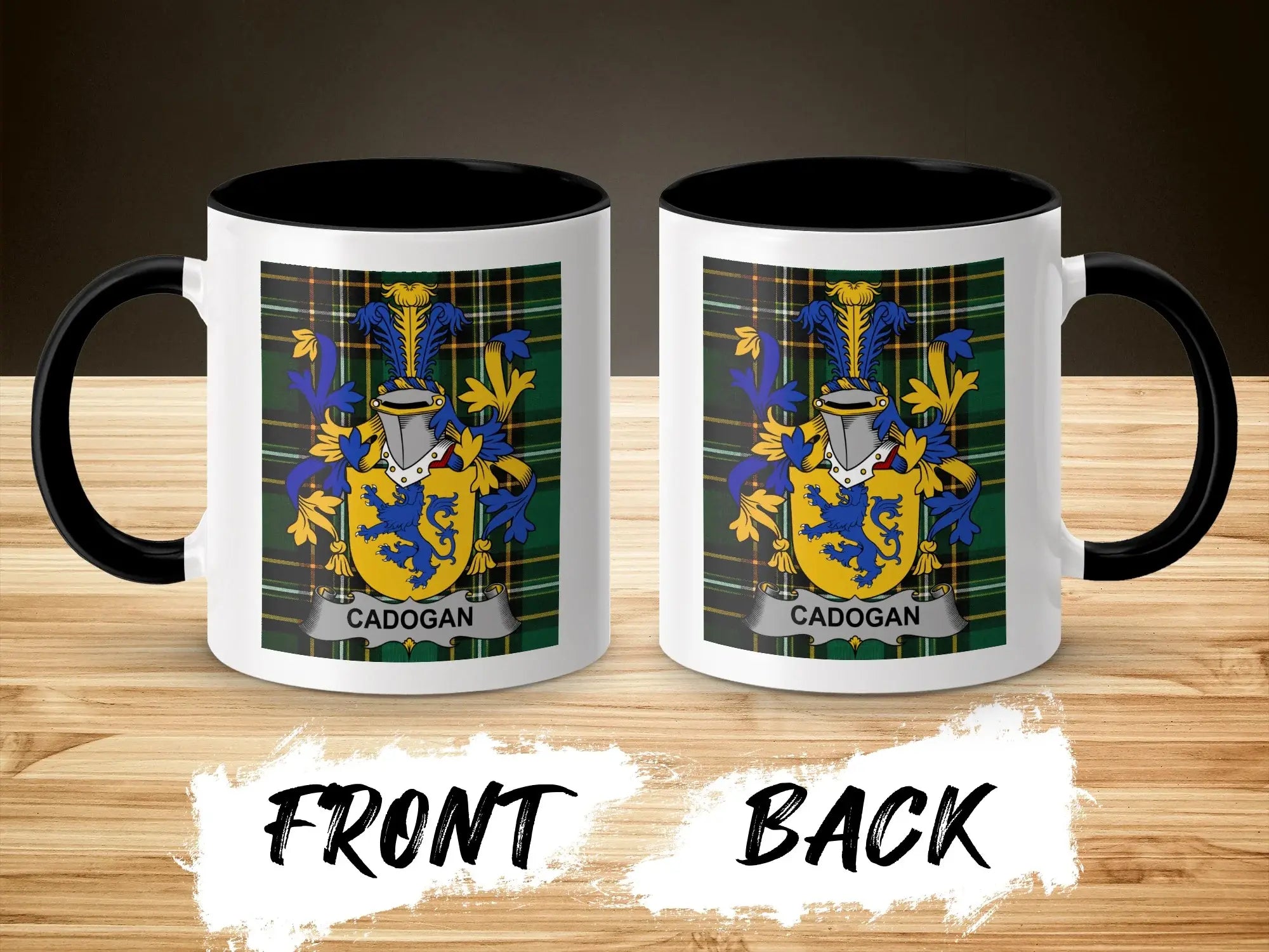 Two mugs with the Cadogan coat of arms on a wooden surface.