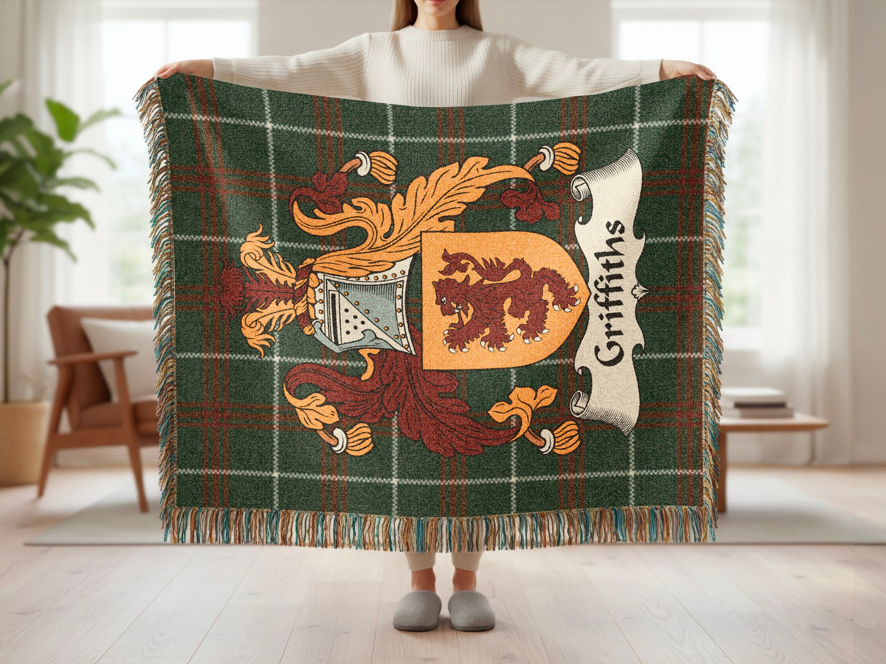 Tartan blanket with Griffiths family crest and fringe.