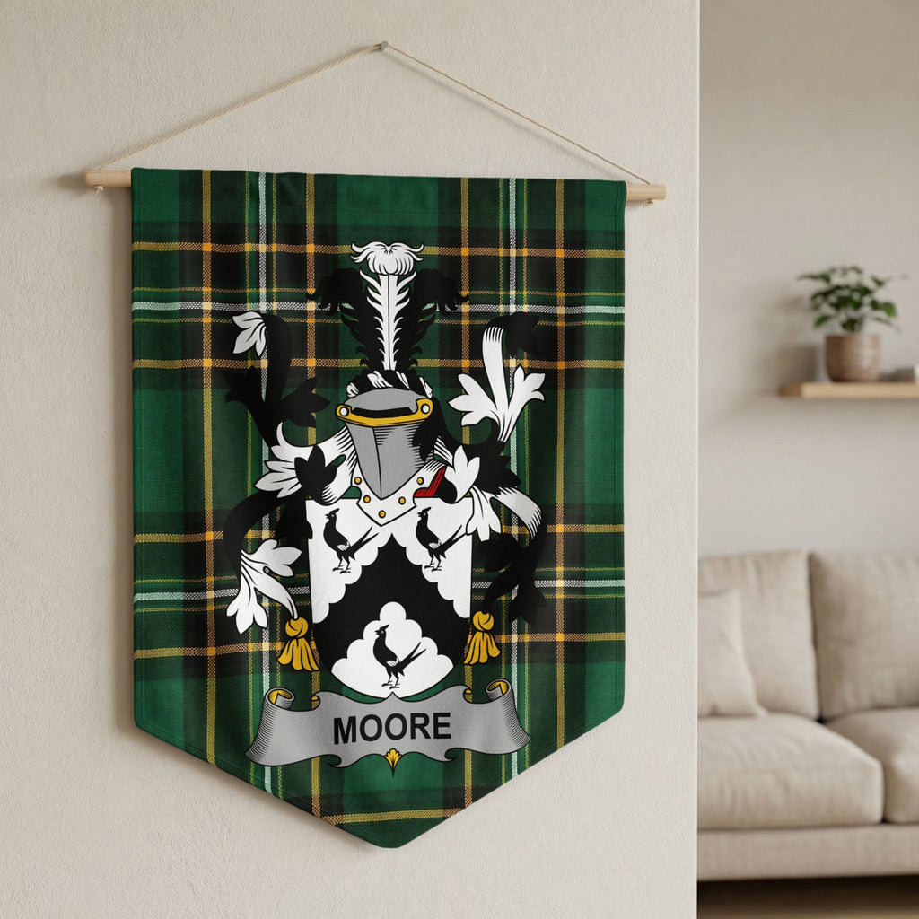 Moore family crest on a green tartan banner hanging on a wall.