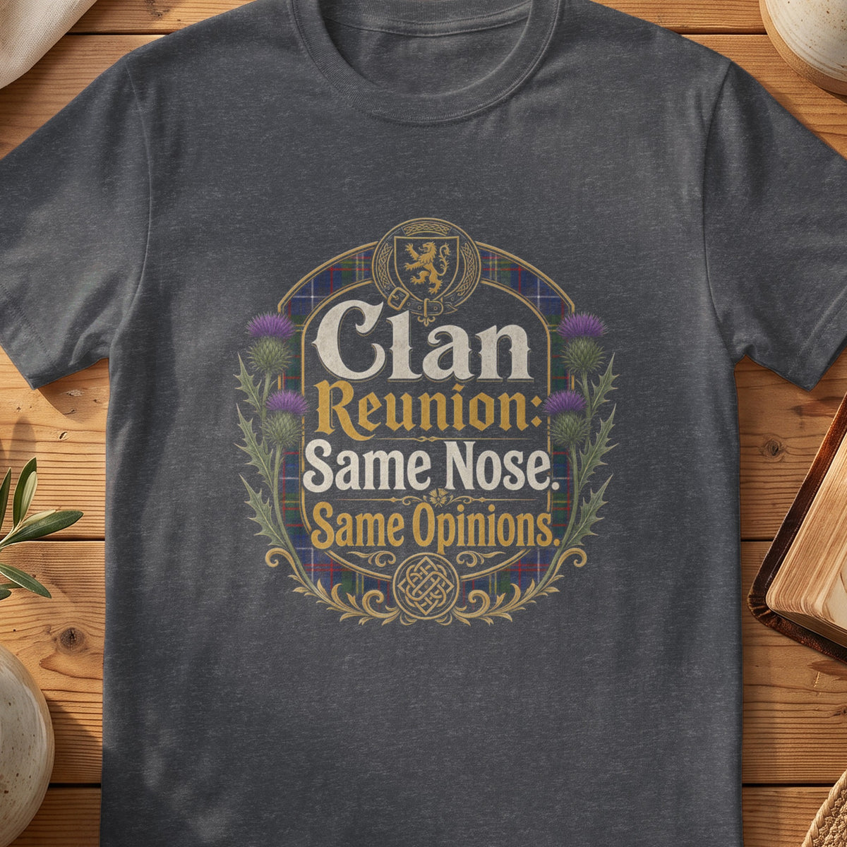 Dark grey Gildan 64000 unisex T-shirt flatlay with Clan Reunion Same Nose Same Opinions Scottish graphic design