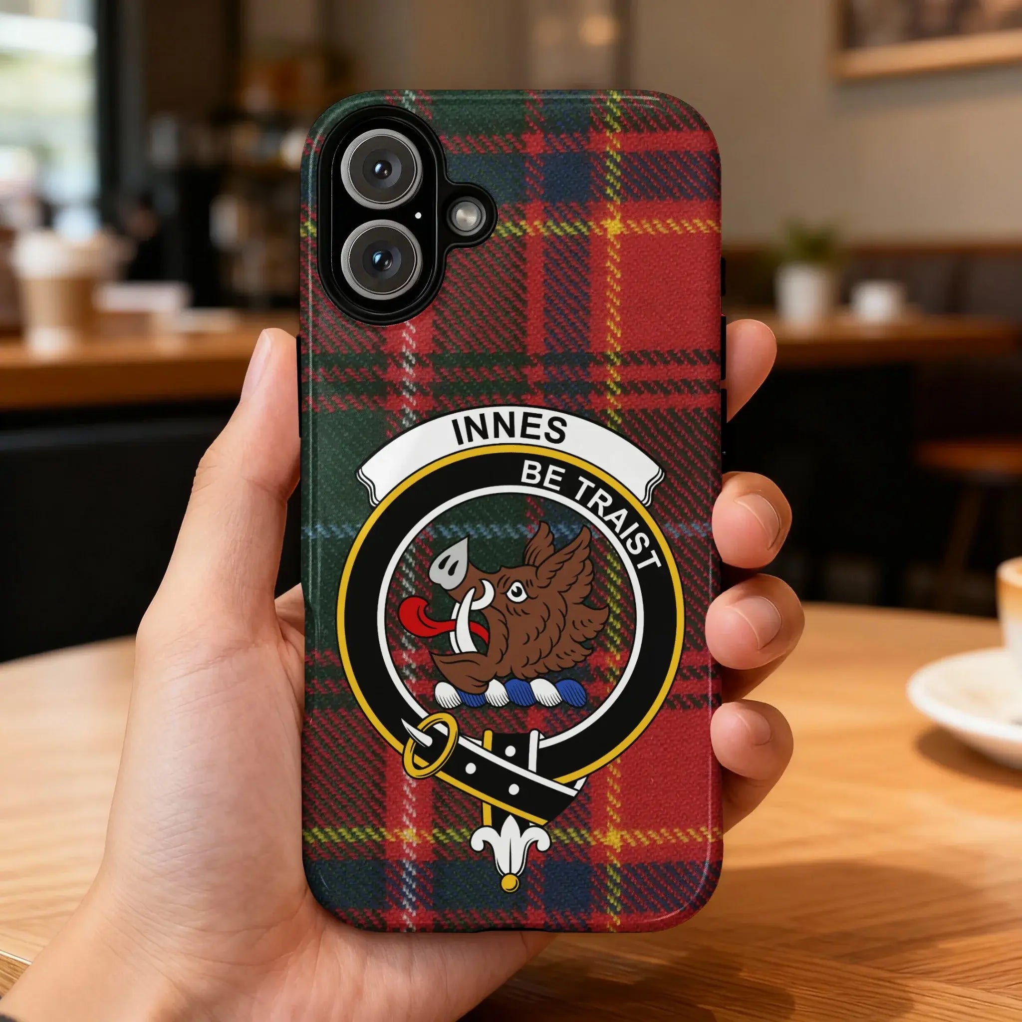 Innes clan tartan phone case with boar's head crest — full heraldic wrap on glossy impact-resistant shell