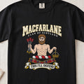 MacFarlane graphic T-shirt in Black, front flat lay showing varsity lettering and bearded bare-chested man holding a bundle of arrows and a crown.