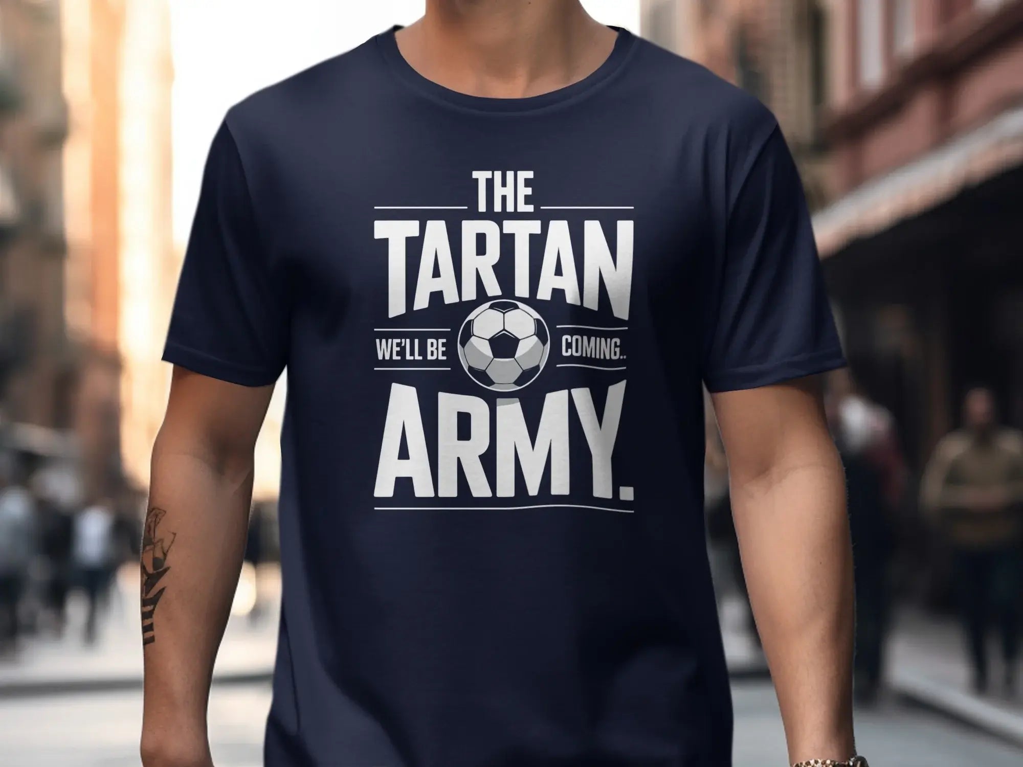 Navy t-shirt with "The Tartan Army We'll Be Coming" text and soccer ball.