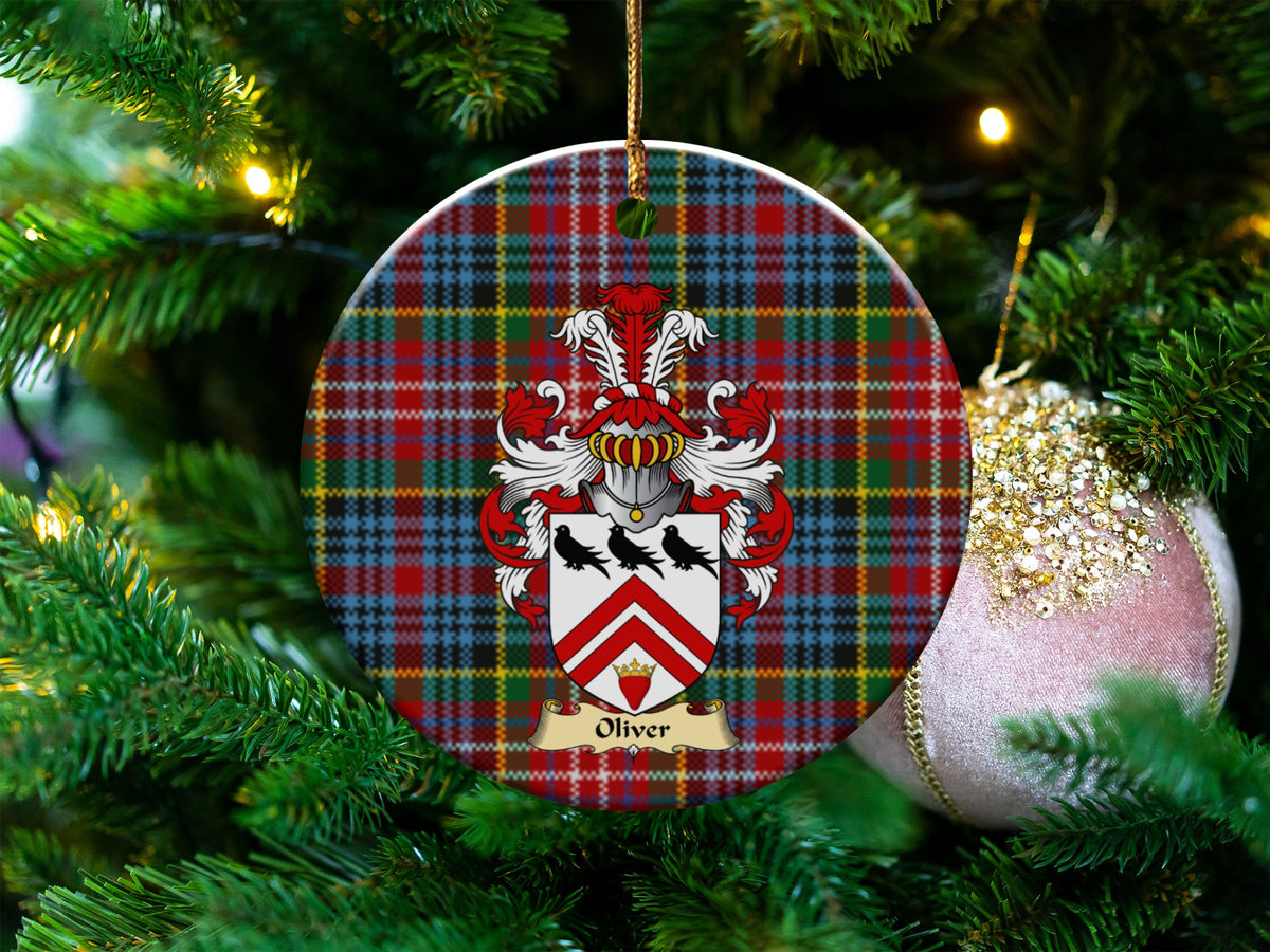 Oliver Scottish clan ceramic ornament with family crest on a Caledonia tartan background, hanging on a Christmas tree
