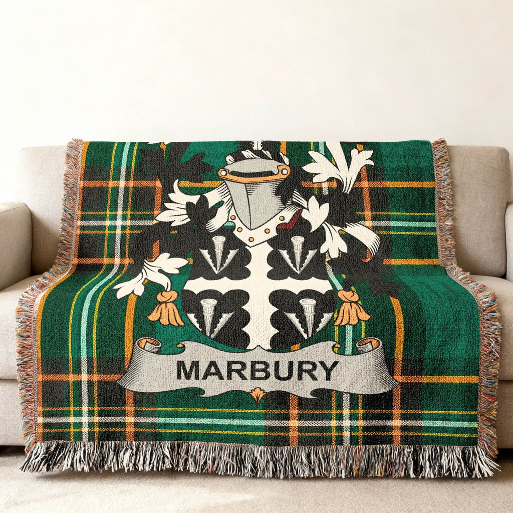 Green plaid throw blanket with Marbury crest and name centered.