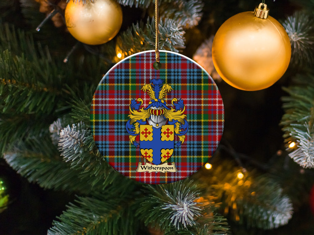 Witherspoon family emblem ceramic Christmas ornament with Caledonia tartan background in festive holiday décor