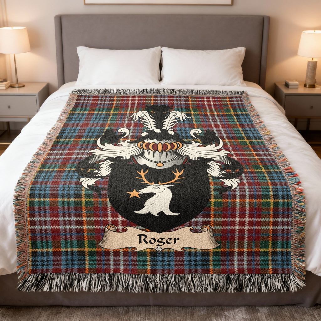 Roger family crest emblem on a Caledonia tartan woven blanket