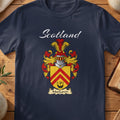 Navy MacLaren family shield T-shirt featuring red chevrons on a gold shield