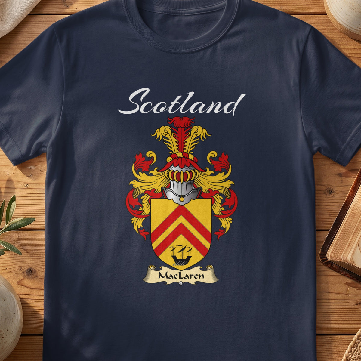 Navy MacLaren family shield T-shirt featuring red chevrons on a gold shield