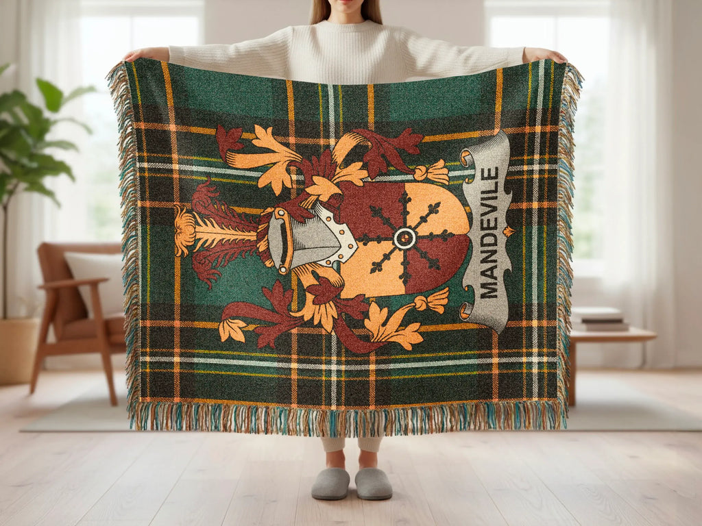 Plaid blanket with a crest featuring the name "Mandeville".
