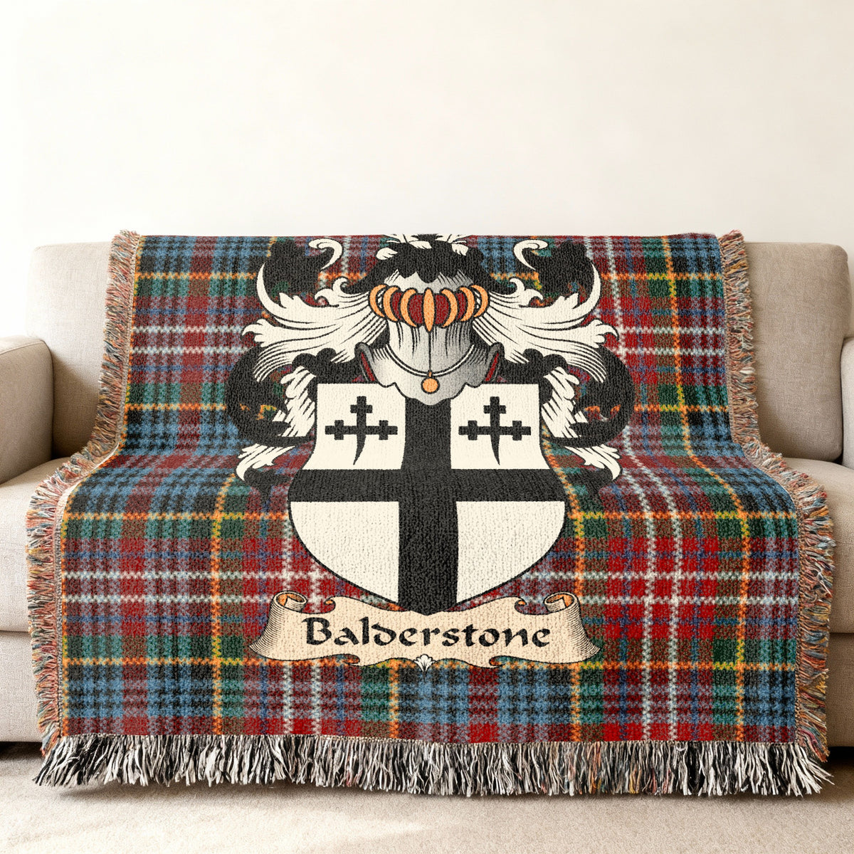 Balderstone Scottish family shield woven blanket on a Caledonia tartan background