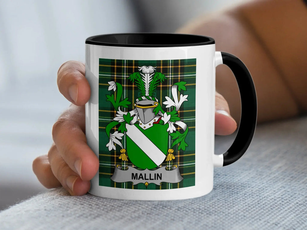 White mug with black rim featuring a green and white family crest with the name "MALLIN".