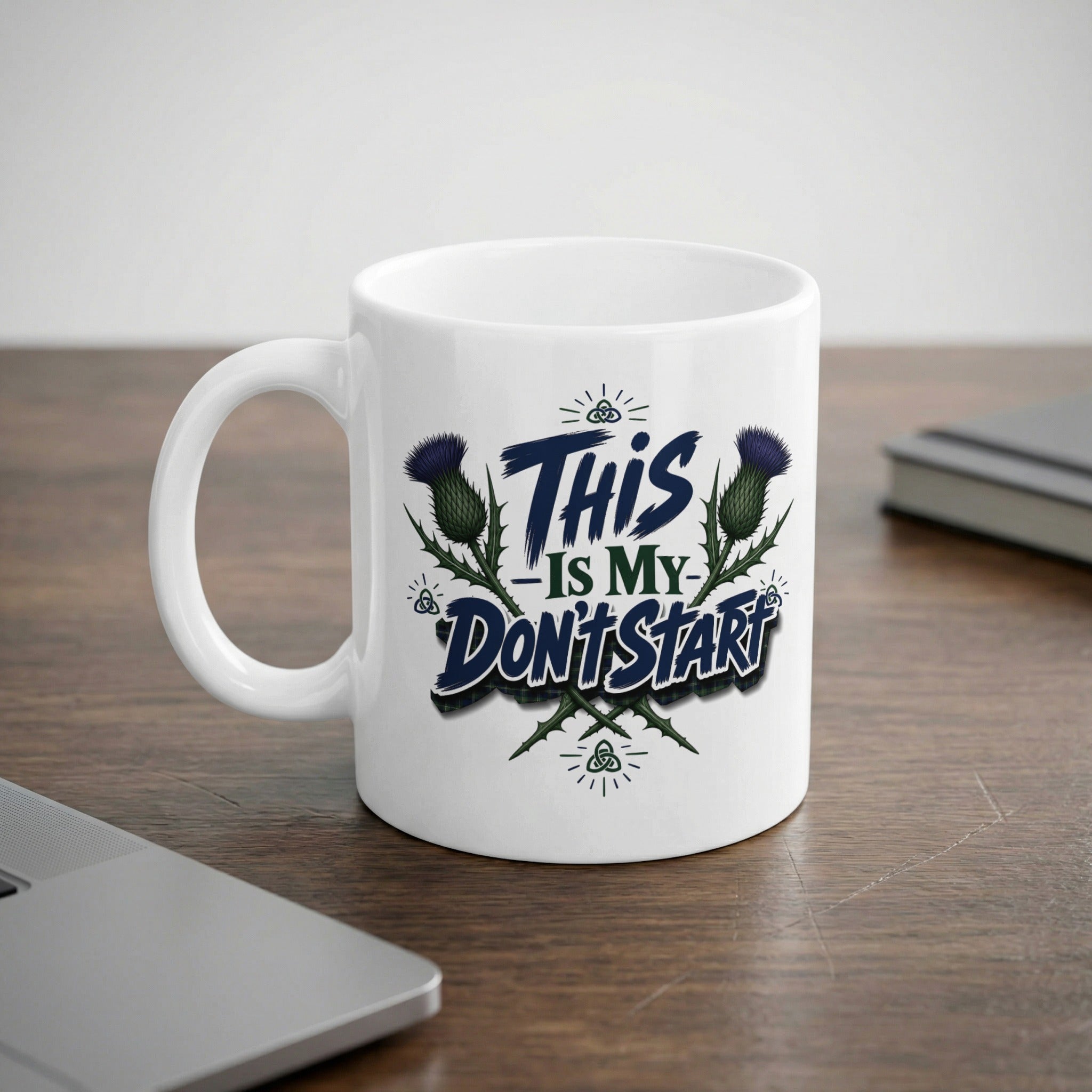 White mug with "This is my don't start" text and thistle design.