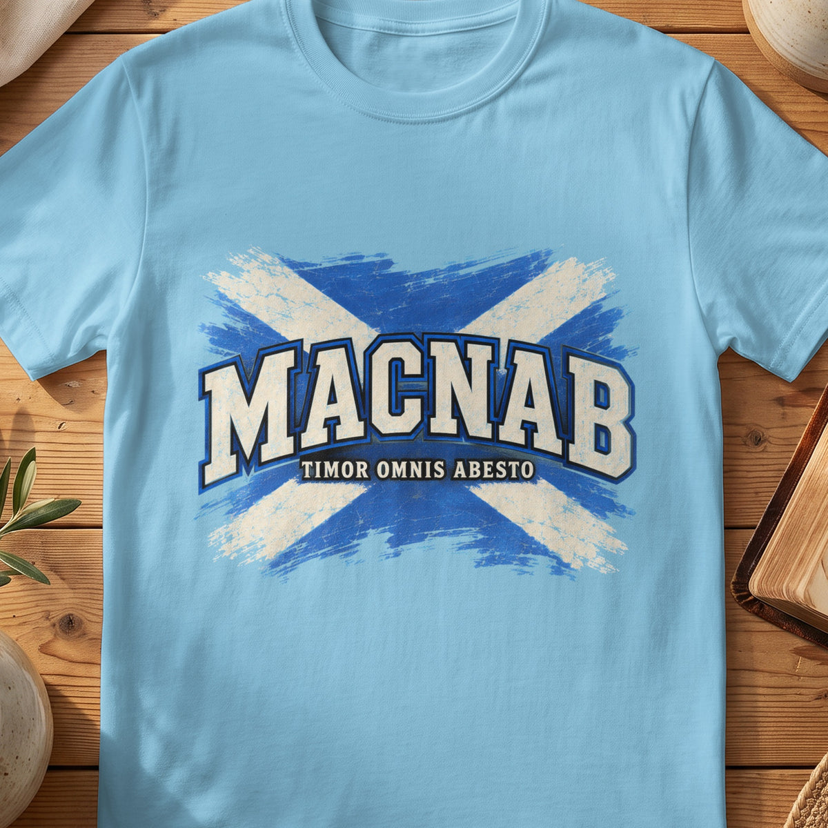 MacNab Scottish Saltire T-shirt in Sky, with distressed blue and cream flag and “Timor Omnis Abesto” lettering.