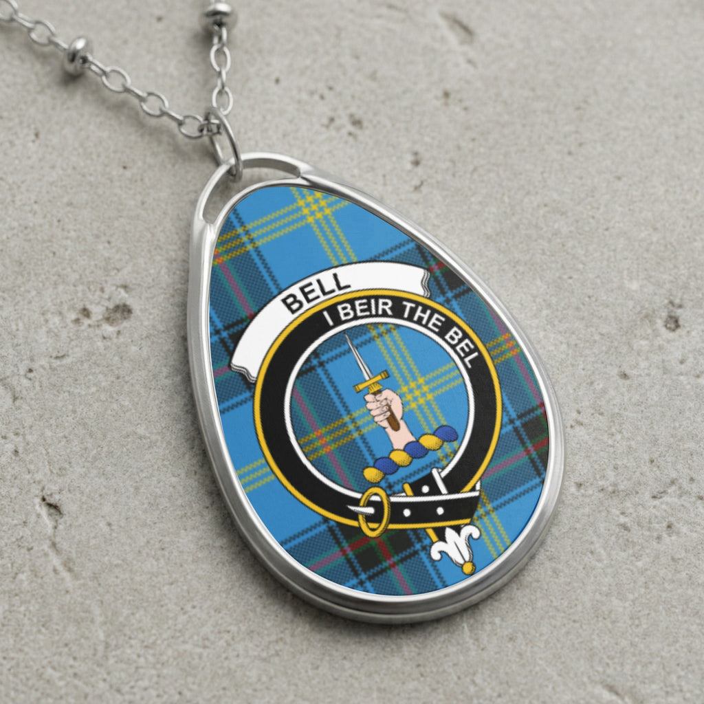 Bell clan Scottish tartan necklace with clan crest and I Beir The Bel motto on tartan background