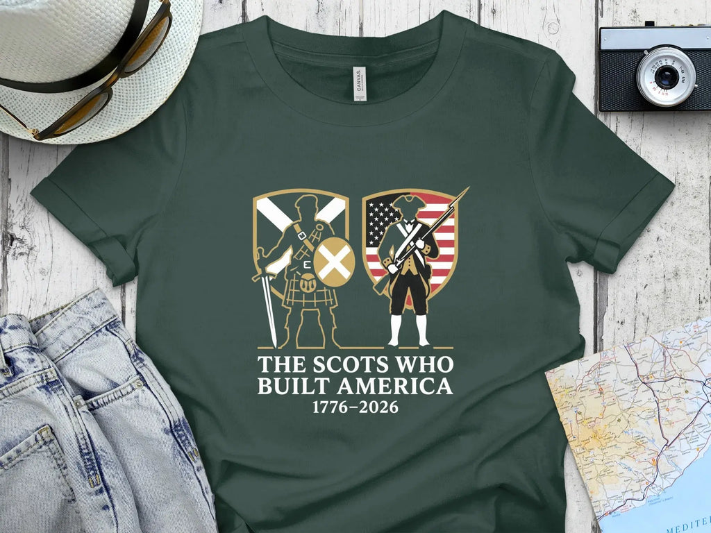 Green t-shirt with "The Scots Who Built America 1776-2026" text and graphics.