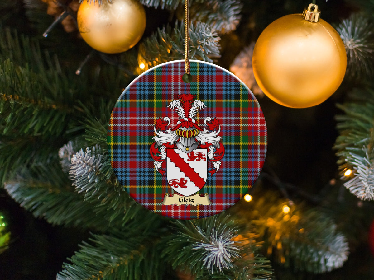 Gleis family emblem ceramic Christmas ornament with Caledonia tartan background in festive holiday décor
