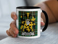 White mug with black rim featuring a tartan pattern and a family crest with the name "BARKER".