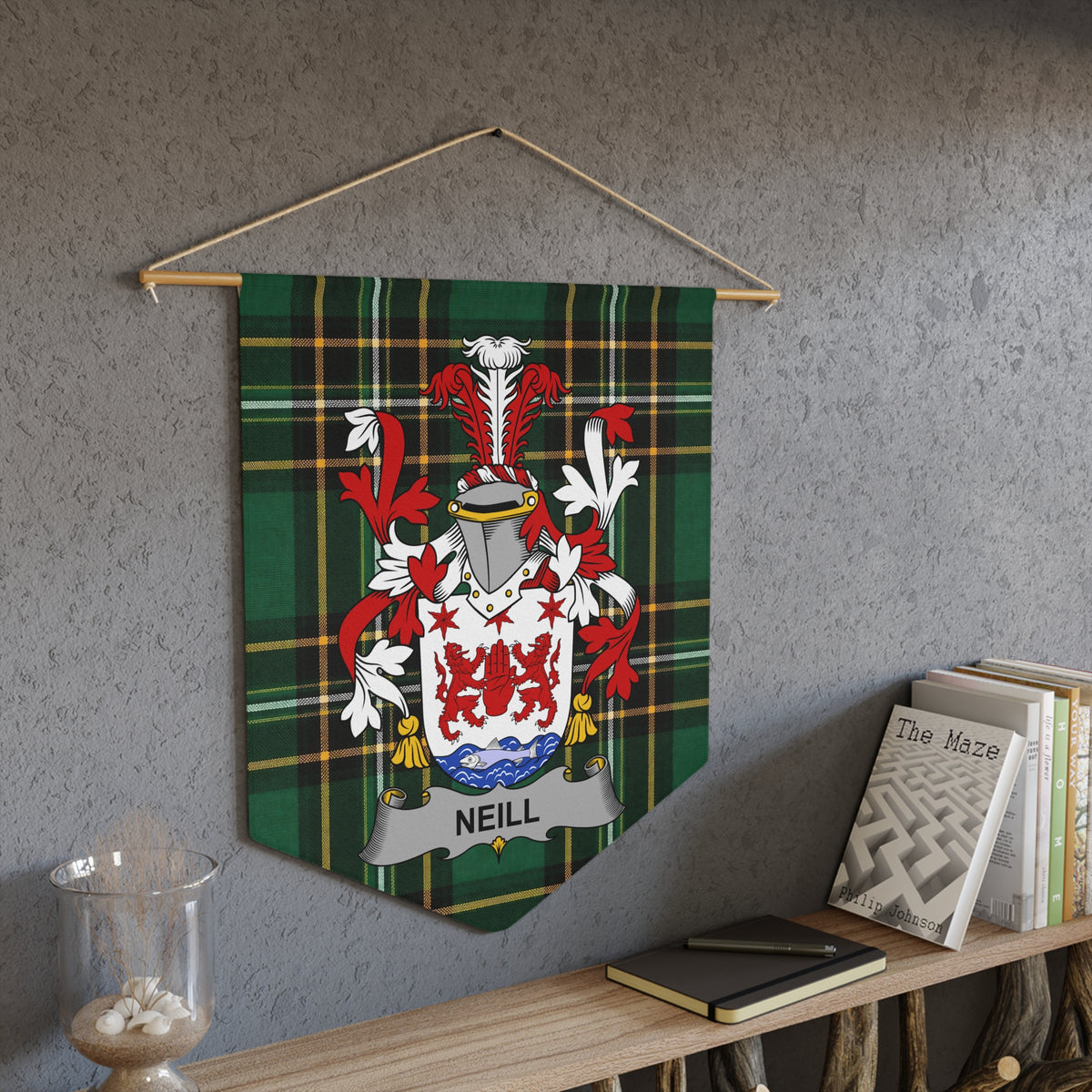 Neill family crest banner on green tartan fabric hanging on wall