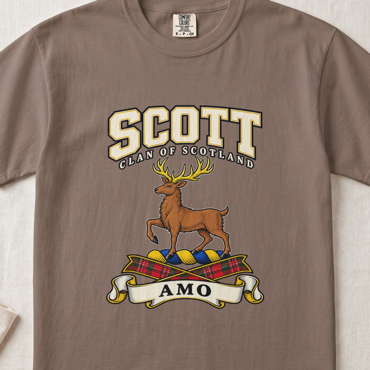 Scott graphic T-shirt in Espresso brown, front flat lay showing varsity lettering and brown stag with gold antlers and one raised front leg.