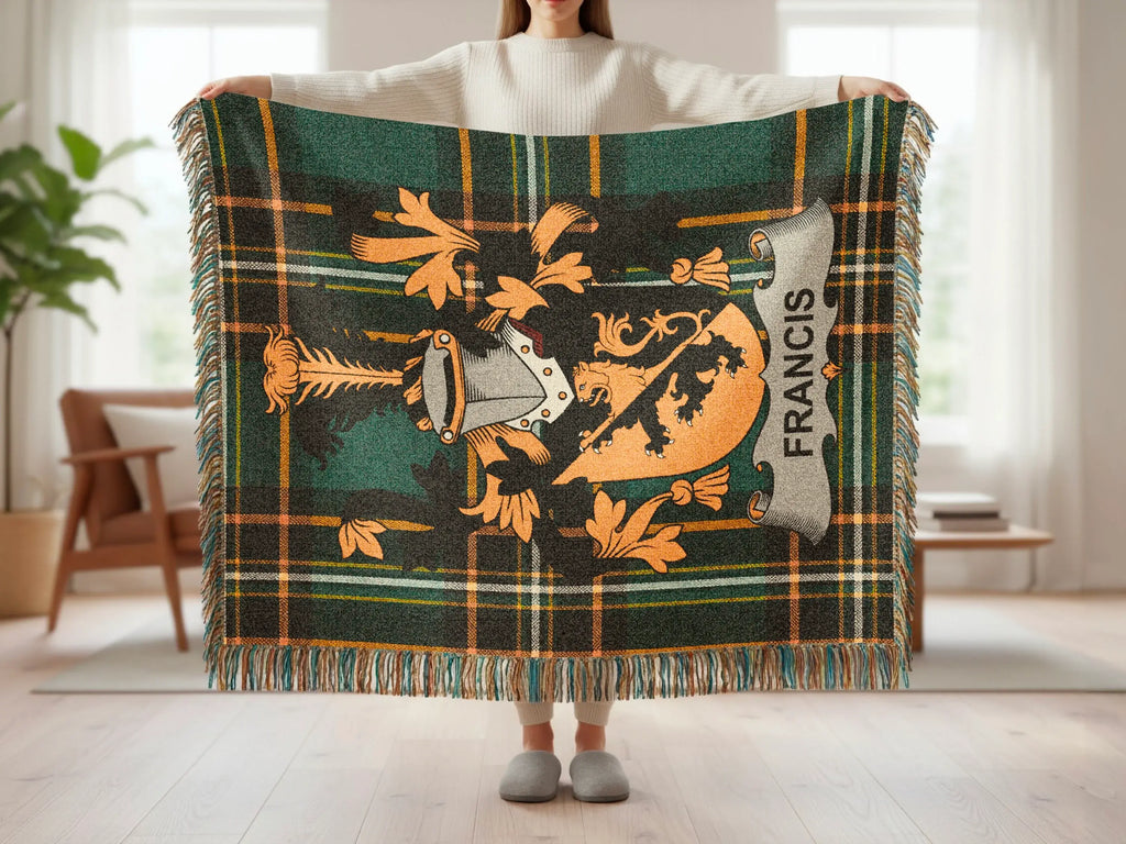 Plaid blanket with a shield emblem and the name FRANCIS.