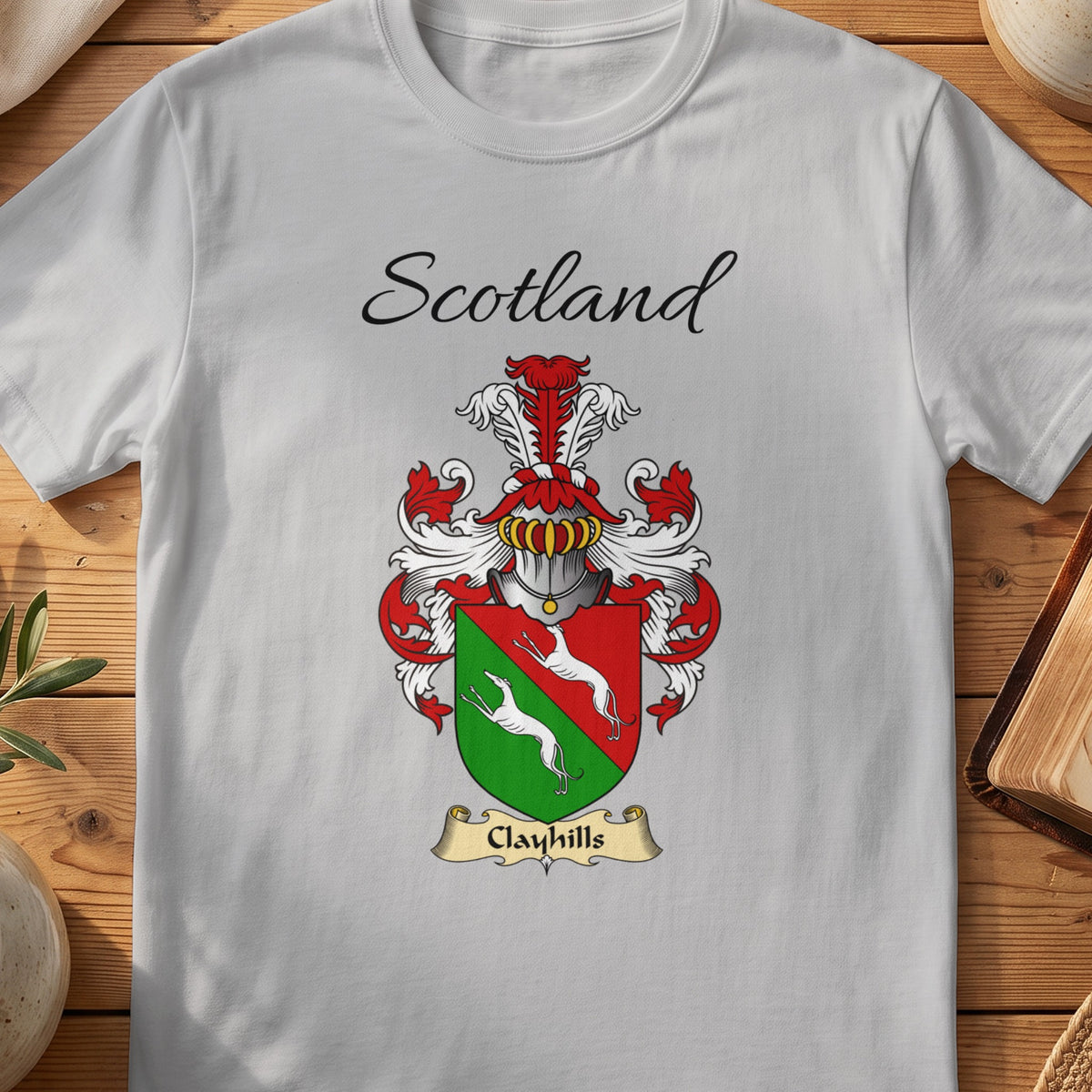 Sport Grey Clayhills Scottish family shield T-shirt featuring white animals on a red-and-green shield