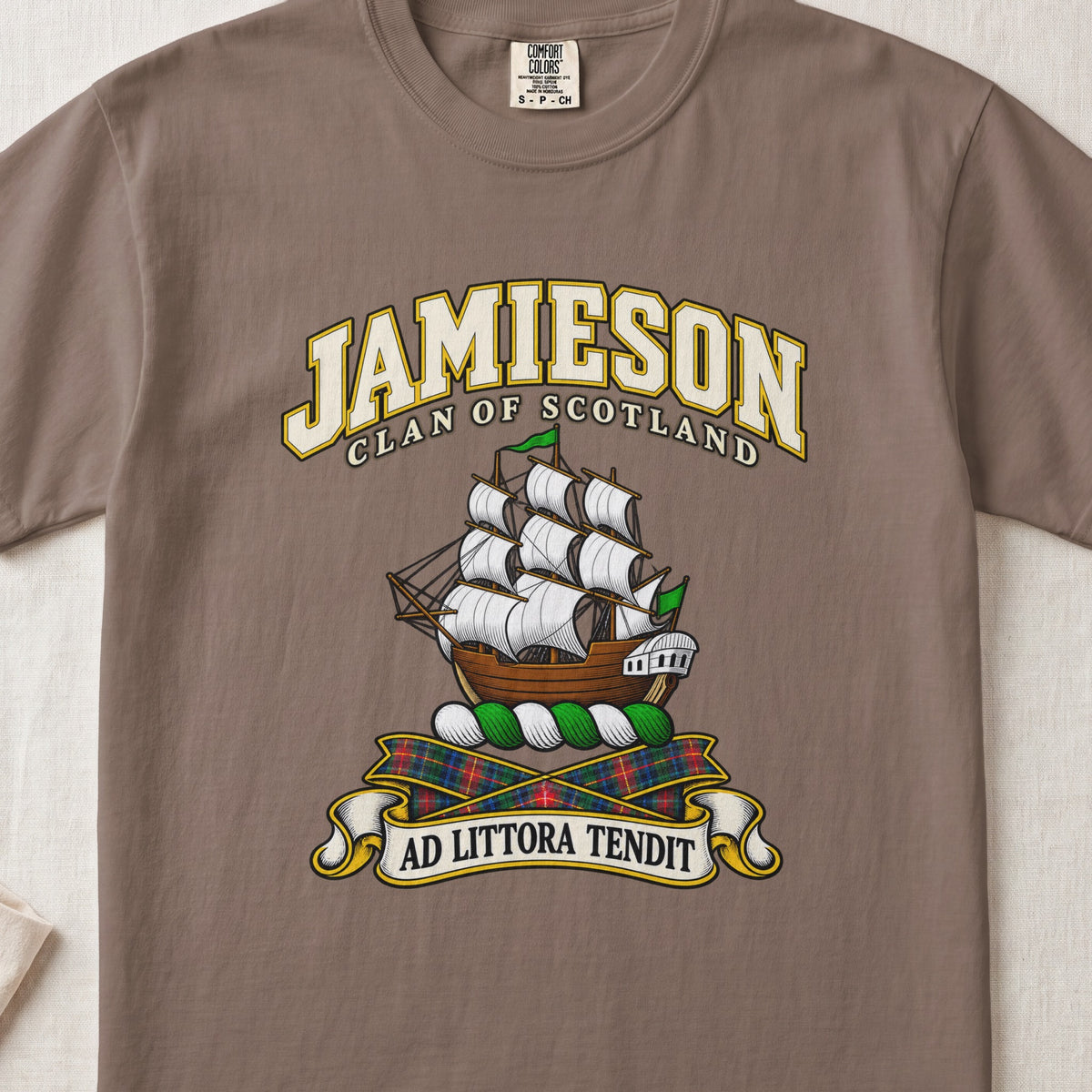 Jamieson Scottish clan T-shirt in Espresso, front view with a sailing ship with white sails and green pennants and motto banner.