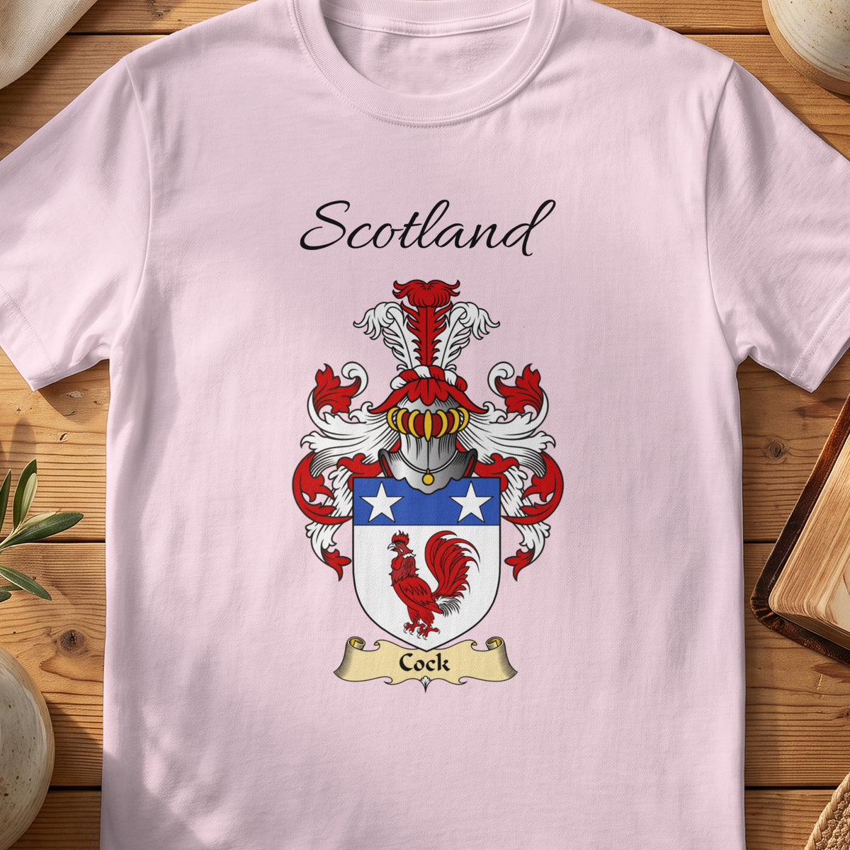 Light Pink Cock Scottish family shield T-shirt featuring a red cockerel beneath white stars on blue