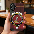 Clan Wallace pro libertate plaid case — glossy edge-to-edge crest print, iPhone shown