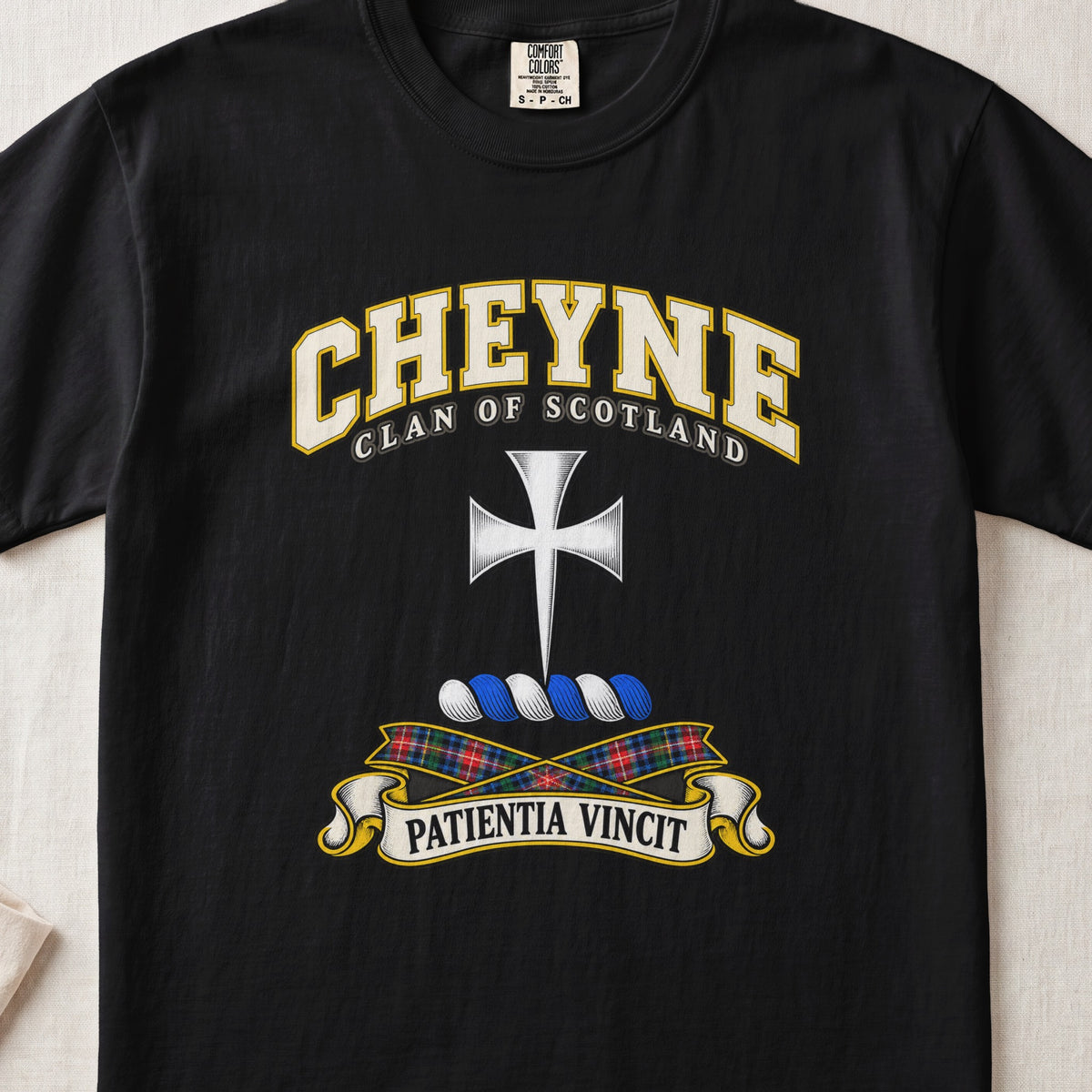 Cheyne Scottish clan T-shirt in Black, front view with a silver cross with flared arms and motto design.