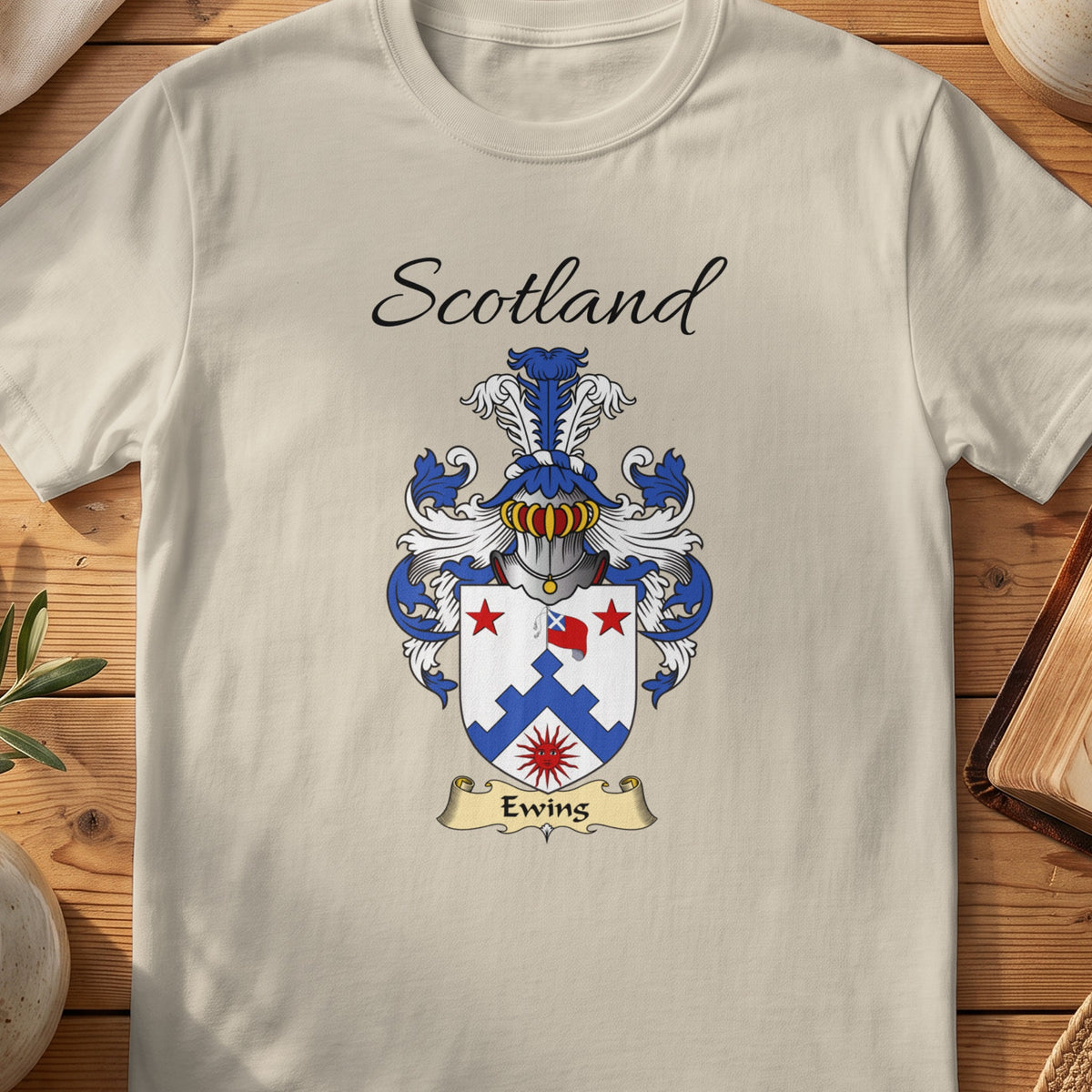 Sand Ewing Scottish family shield T-shirt featuring a blue stepped chevron with red stars