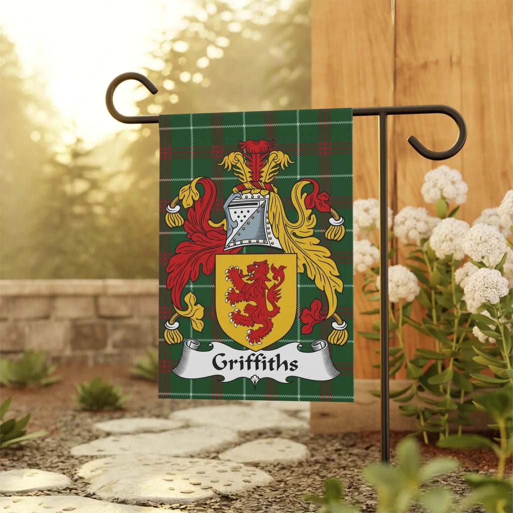 Griffiths family crest on a tartan flag hanging from a garden stake.