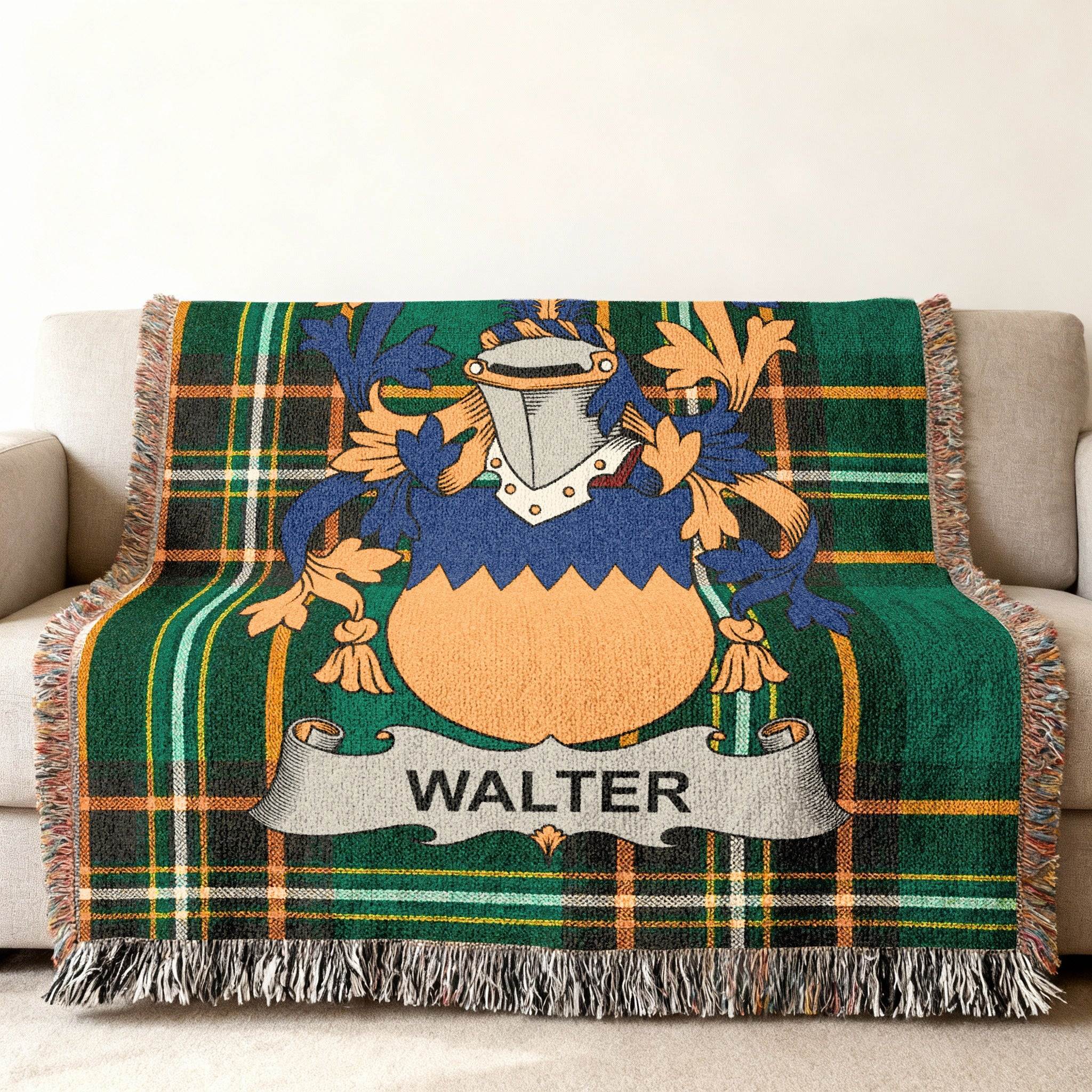 Woven blanket with Walter family crest and green plaid design.