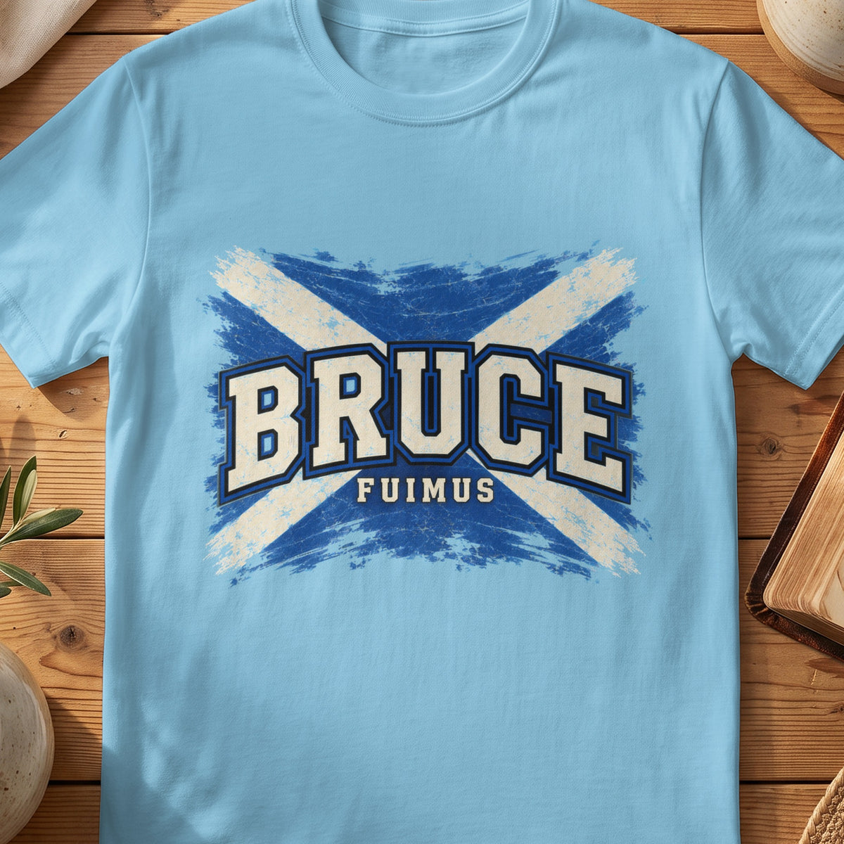 Bruce Scottish Saltire T-shirt in Sky, with distressed blue and cream flag and “Fuimus” lettering.