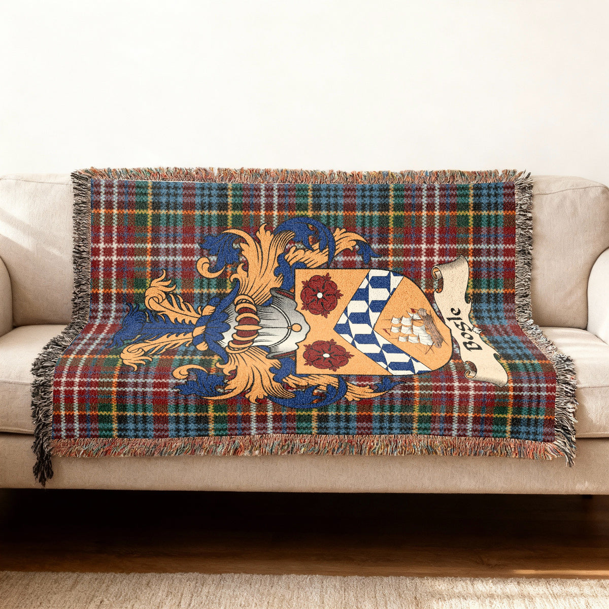 Bogle Scottish woven blanket with family shield and Caledonia tartan background